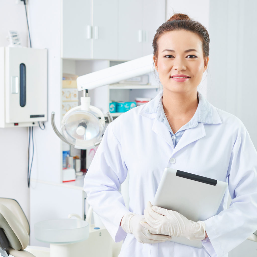 Female dental surgeon in dental office.