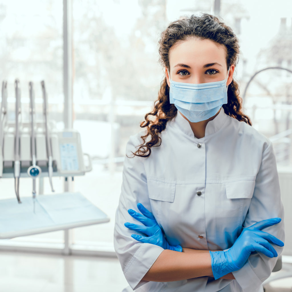 Female oral surgeon in dental office.