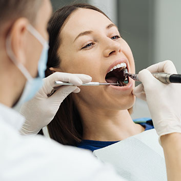 Oral hygiene, dentist doing Scaling and brushing procedure
